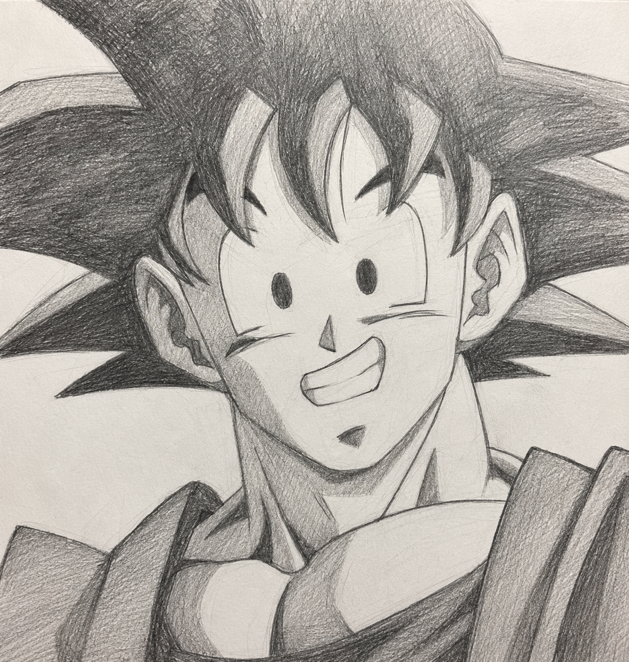 Graphite fan-art portrait of Goku smiling