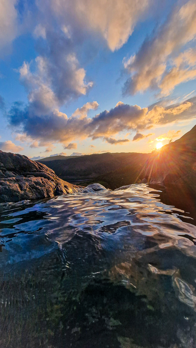 Mountain landscape photography by Tony Livins with lake and evening light